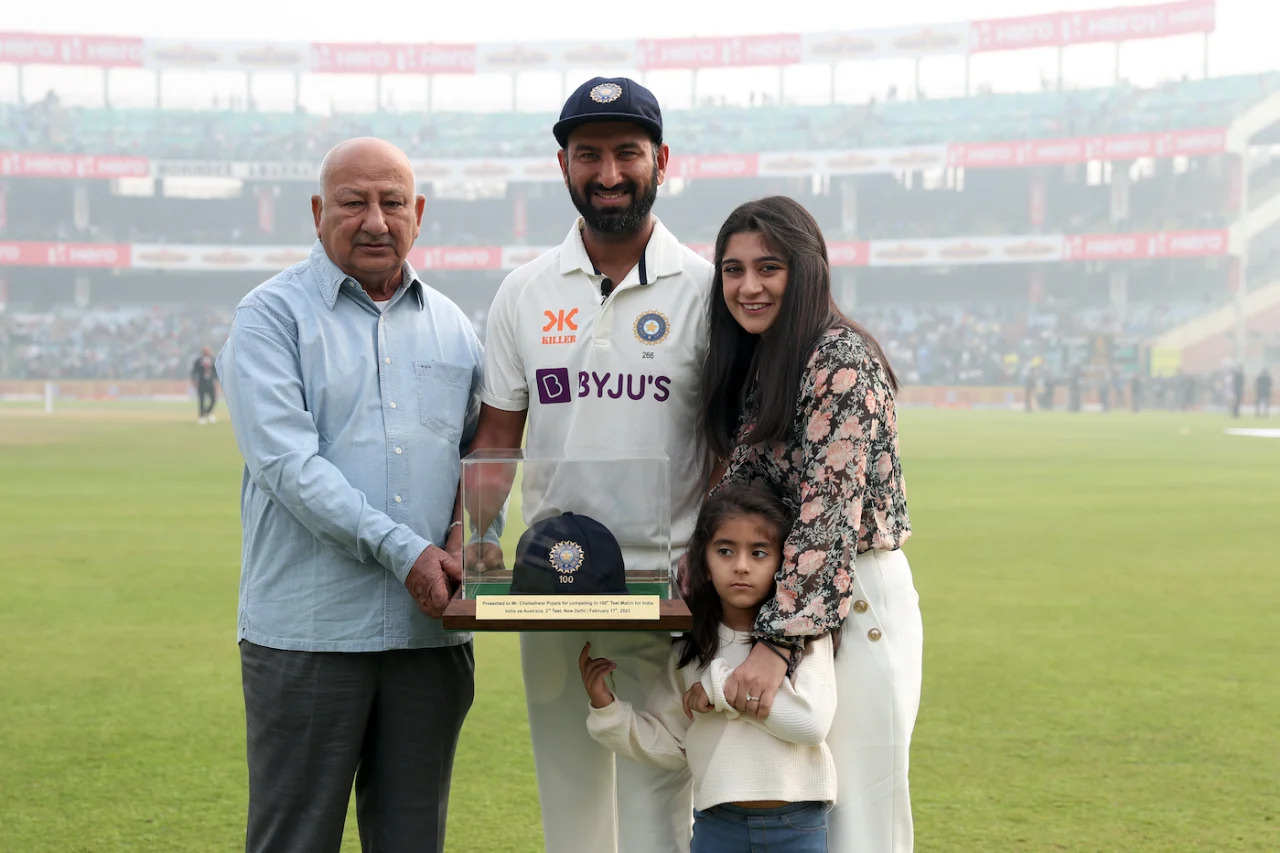Cheteshwar Pujara with his father Arvind and wife Puja and daughter on his 100th Test | BCCI