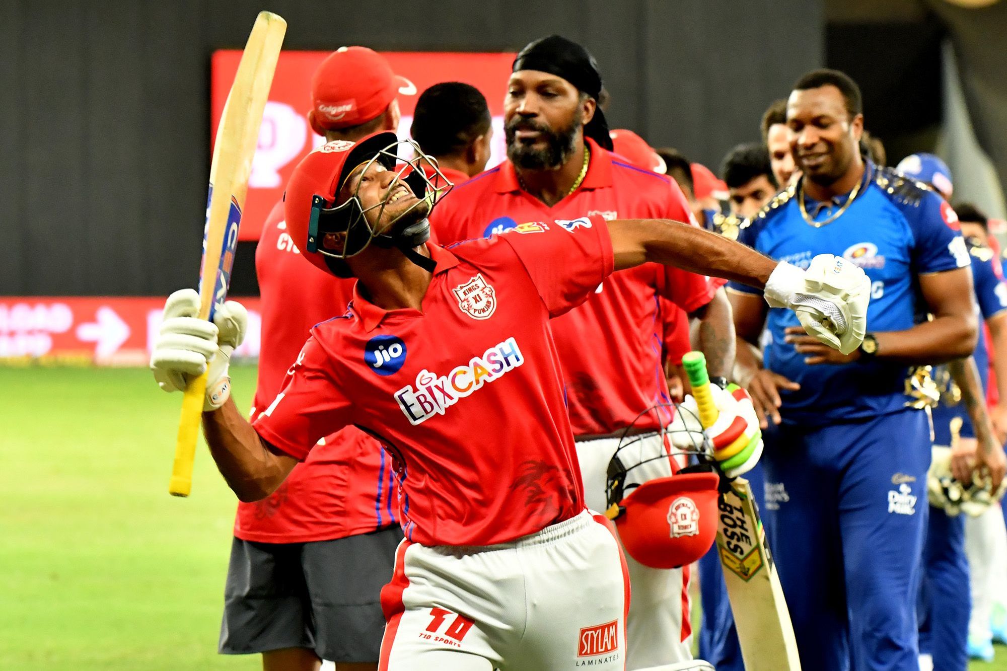 Mayank Agarwal poses with Chris Gayle as KXIP beat MI after two super overs | BCCI/IPL