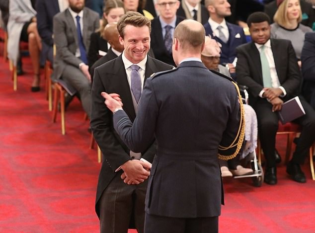 Jos Buttler receives his MBE from Prince William | PA