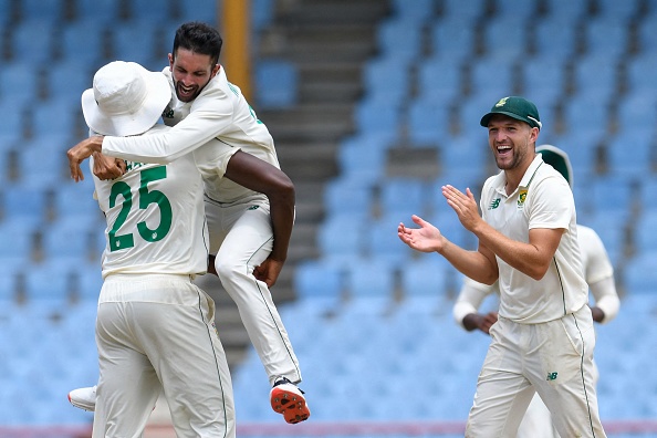 Keshav Maharaj celebrates his “hat-trick” with teammates | Getty Images