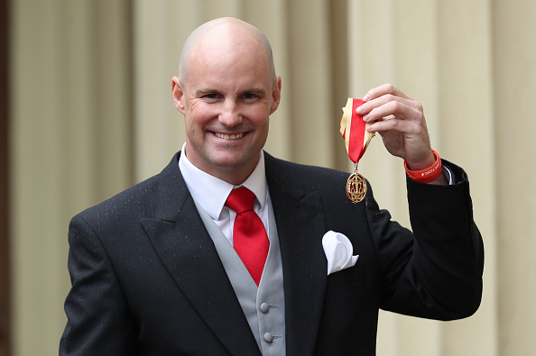 Andrew Strauss posing with his medal at Buckingham Palace in London | Getty