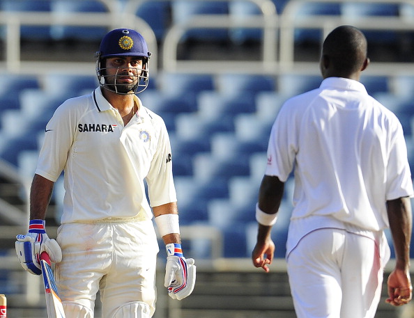 Virat Kohli faces off against Fidel Edwards during his Test debut | Getty