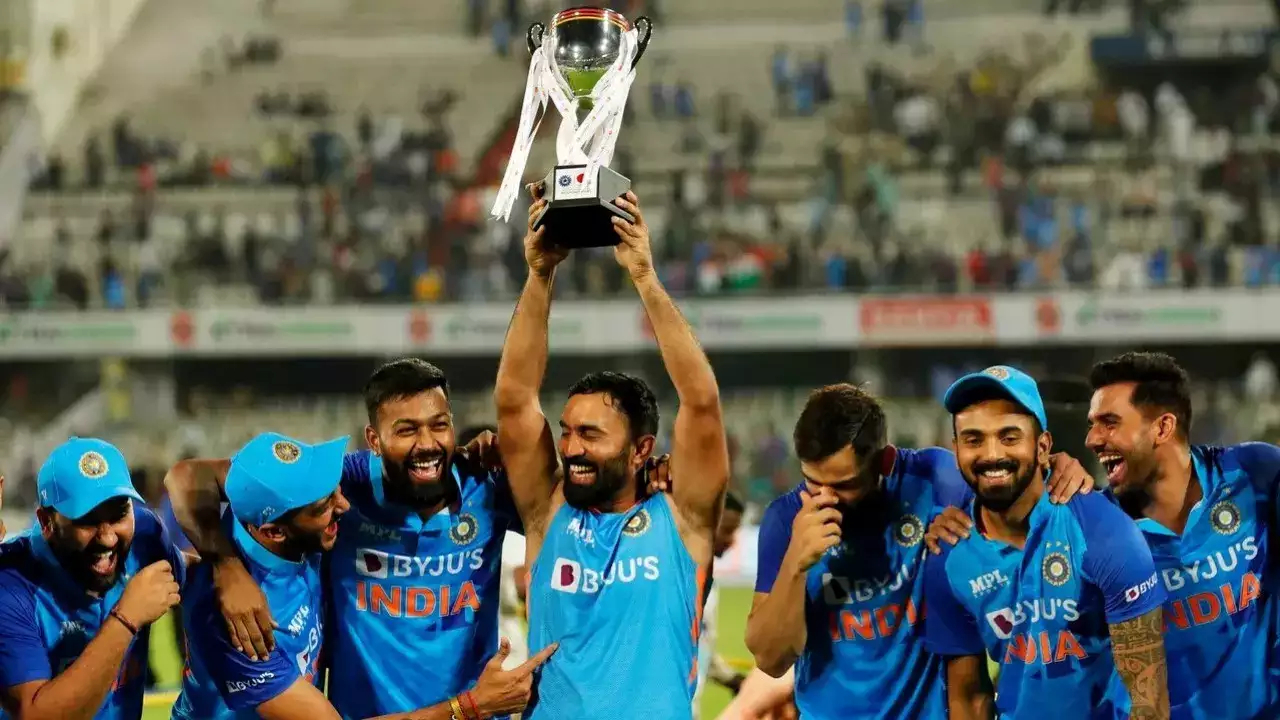 Dinesh Karthik with the series winning trophy | BCCI