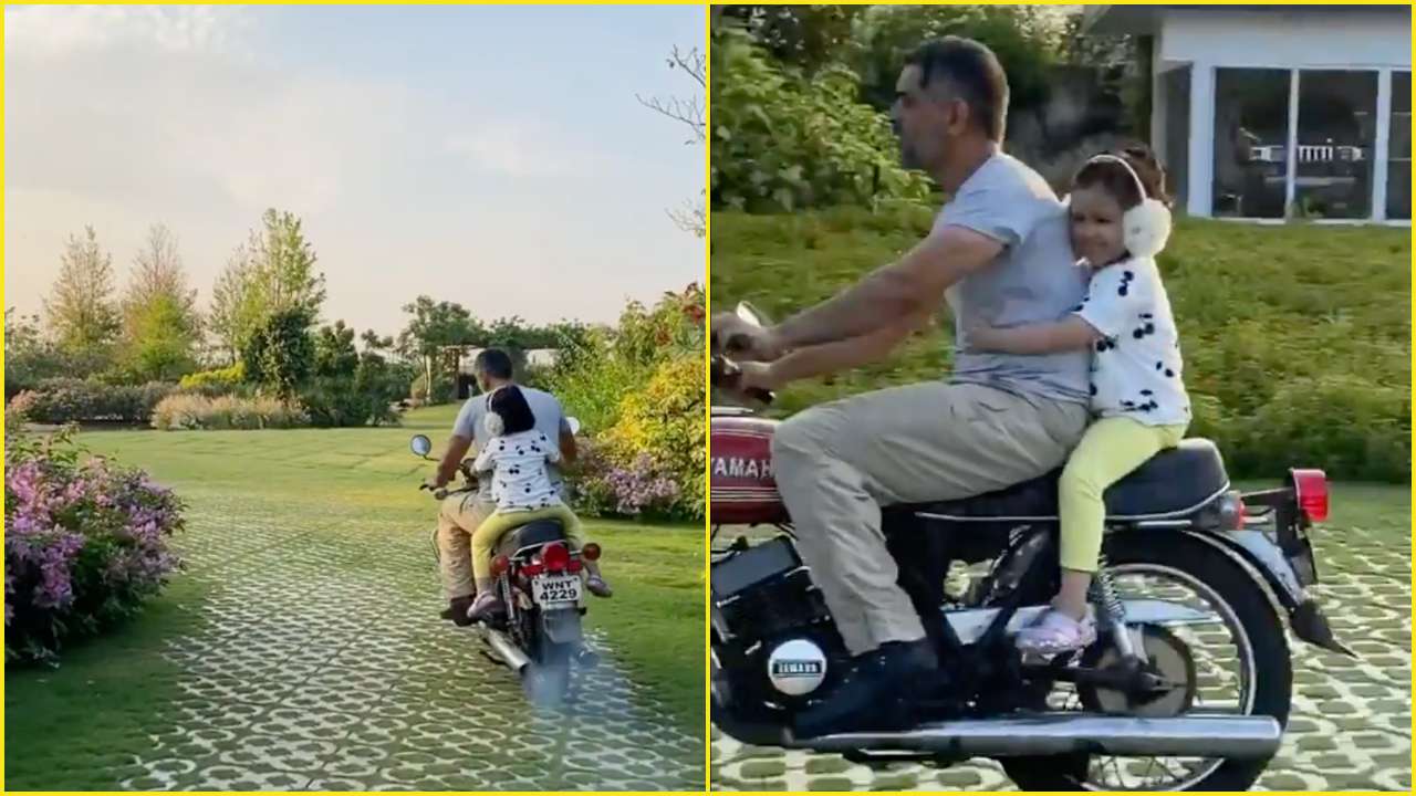 MS Dhoni takes Ziva for a ride on his bike