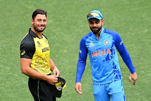 Marcus Stoinis and Virat Kohli | Getty