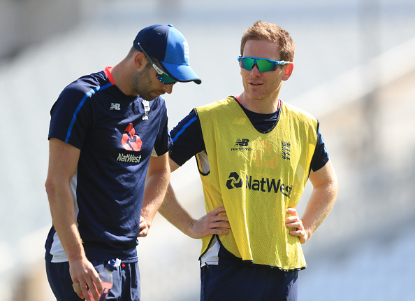 Mark Wood and Eoin Morgan | Getty