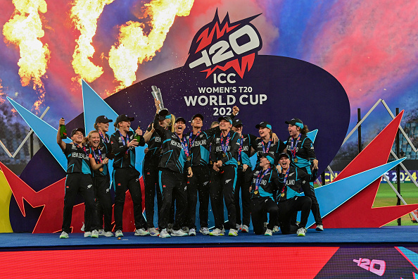 New Zealand players are posing with the ICC Women's T20 World Cup 2024 trophy | Getty