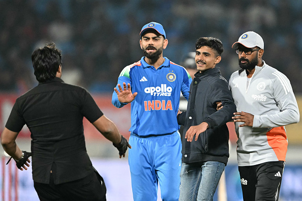 Virat Kohli asks security to be kind to a fan who ran on the field and hugged him | Getty