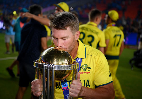 David Warner with the World Cup trophy | Getty