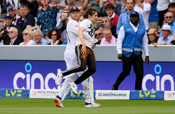 Bairstow picked the protestor and carried him off the field at Lord's | Getty