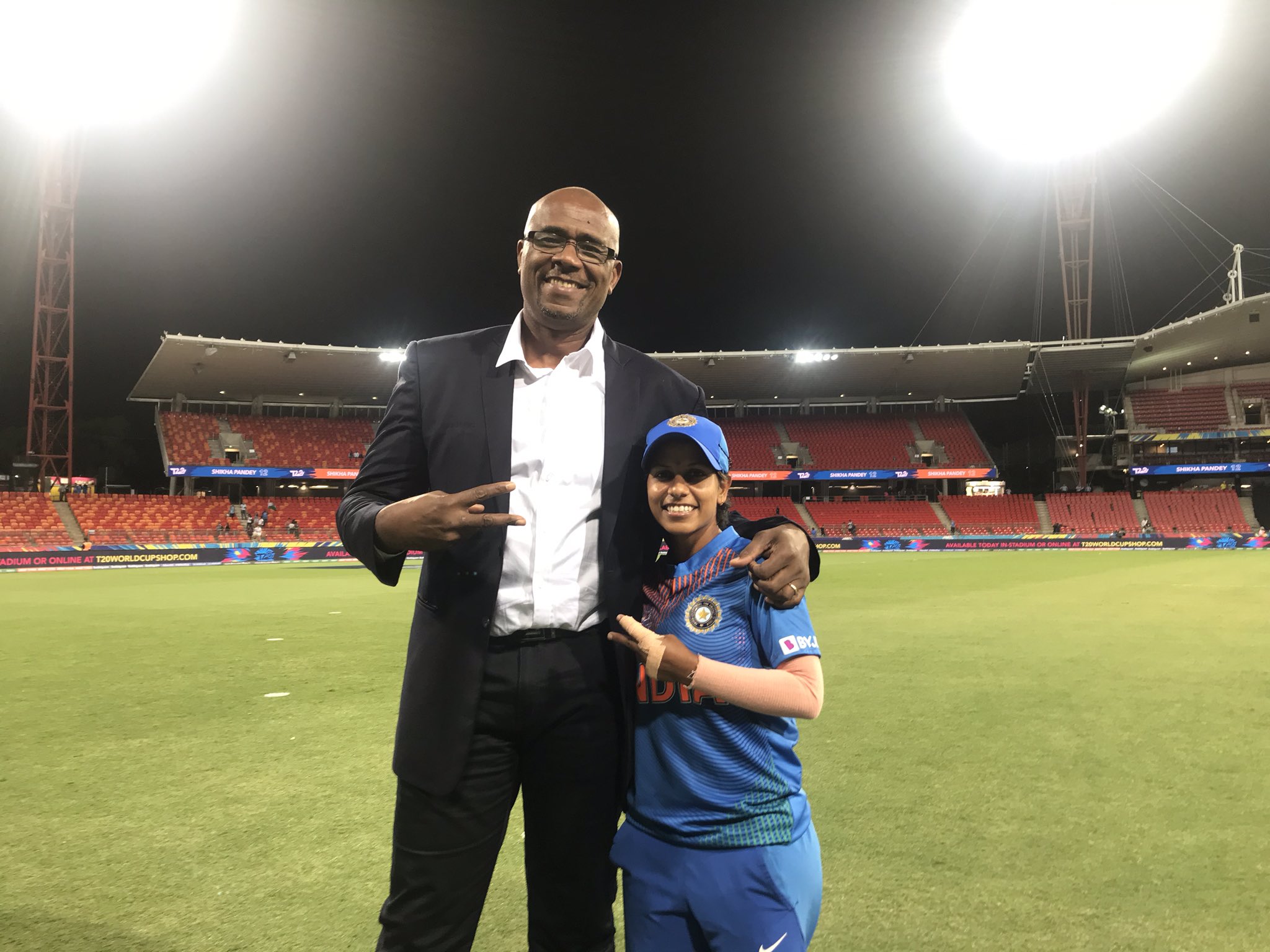 Poonam Yadav with Ian Bishop | Twitter