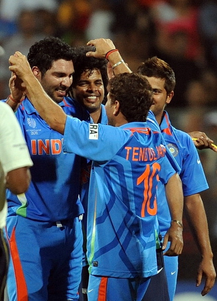 Sachin Tendulkar hugs Yuvraj Singh after India wins the 2011 World Cup | Getty