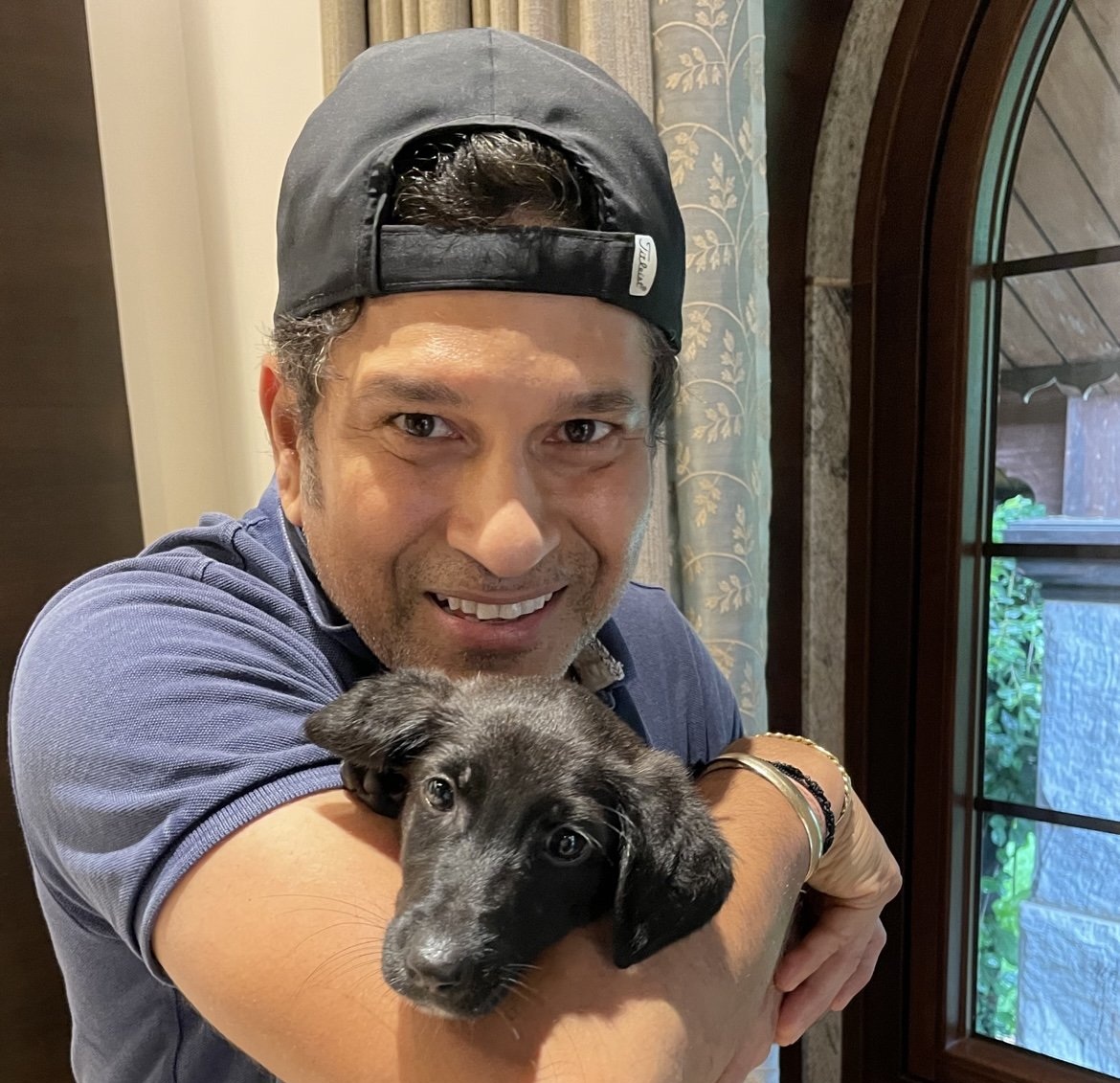 Sachin Tendulkar with his pup Spike | Twitter