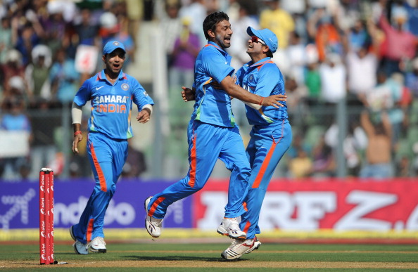 Praveen Kumar and Suresh Raina celebrating a wicket | GETTY 