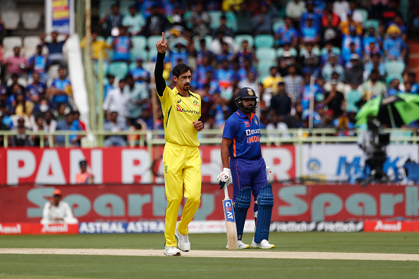 Mitchell Starc celebrates the dismissal of Rohit Sharma | Getty