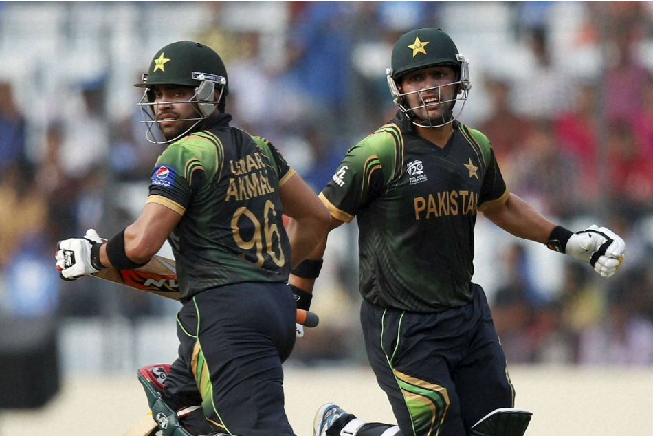 Umar and Kamran both played for Pakistan | AFP