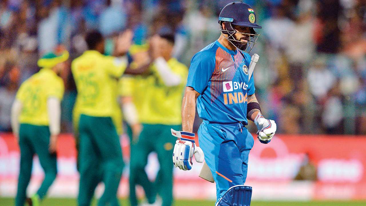 Virat Kohli returns to pavilion after being dismissed for 9 in the third T20I in Bengaluru | AFP
