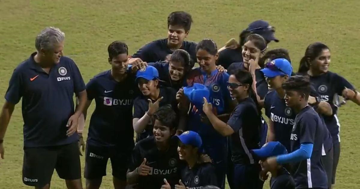 Kaur flanked by teammates after receiving special cap for her 100th T20I | Twitter