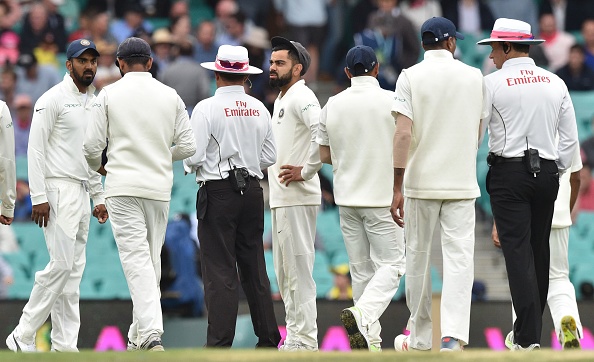 Indian team in conversation with umpires over bad light | Getty