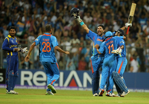 Yuvraj Singh and MS Dhoni celebrate India's win in final | Getty