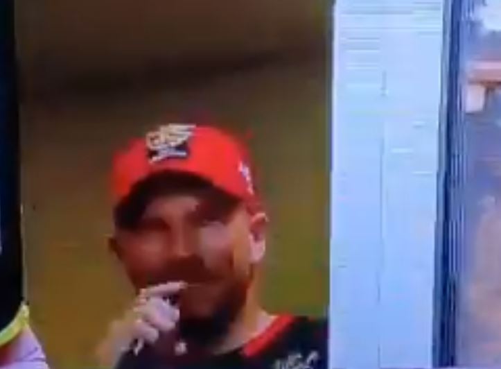 Finch using an e-cigarette during the match against RR 