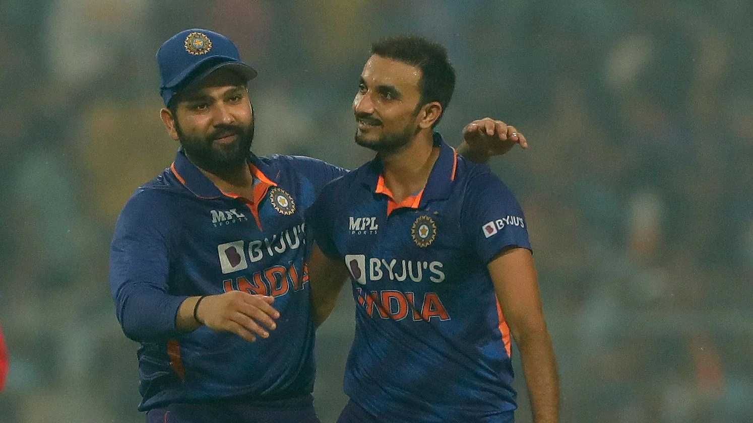 Harshal Patel and Rohit Sharma | Getty
