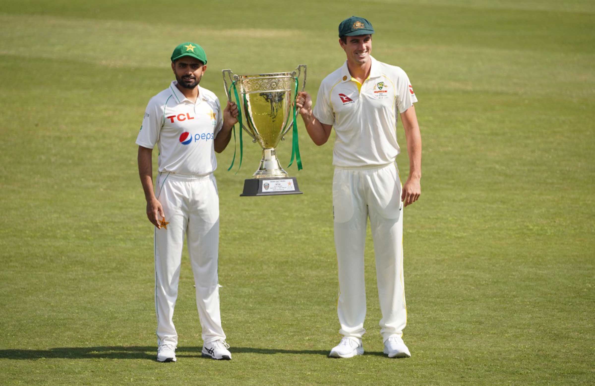 Babar Azam and Pat Cummins with the Test trophy | PCB Twitter