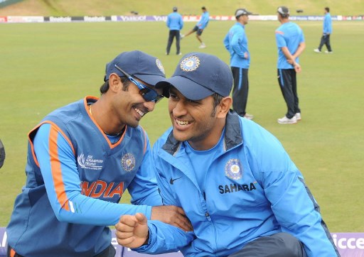 Dhoni and Karthik | AFP