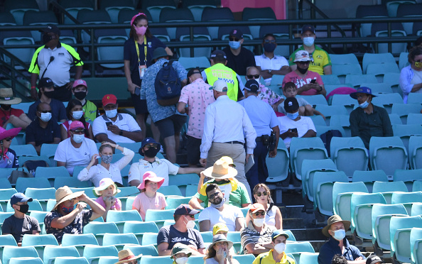 Police escorting group of fans out of the SCG | Getty