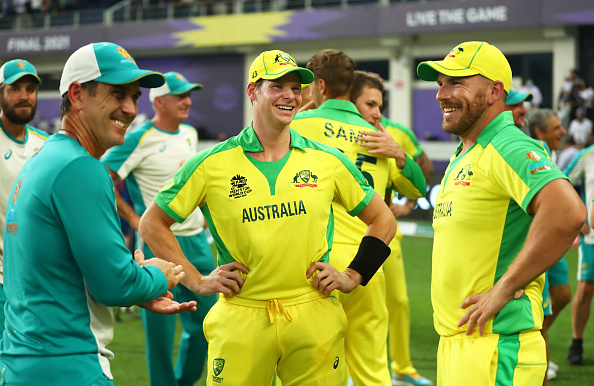 Langer with Smith and Finch after Australia's T20 WC 2021 win | Getty