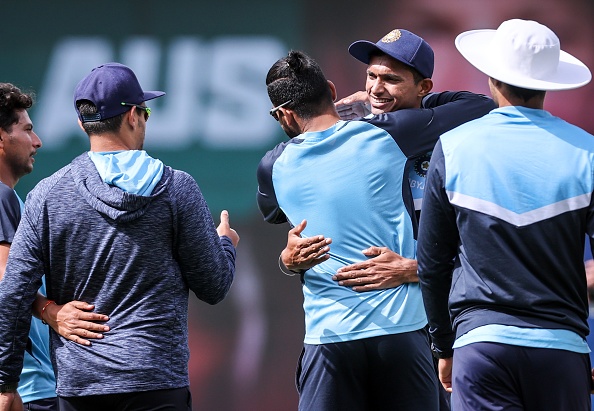 Navdeep Saini hugged by teammates after getting his Test Cap | Getty