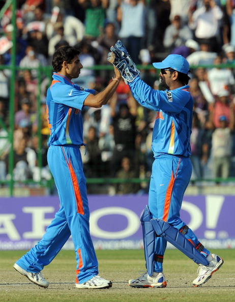 Ashish Nehra and MS Dhoni | Getty