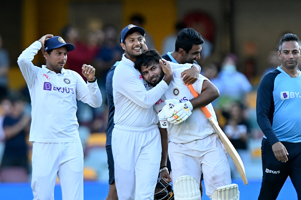 Rishabh Pant being congratulated by his teammates as his 89* helps India chase down 328 to win | Getty