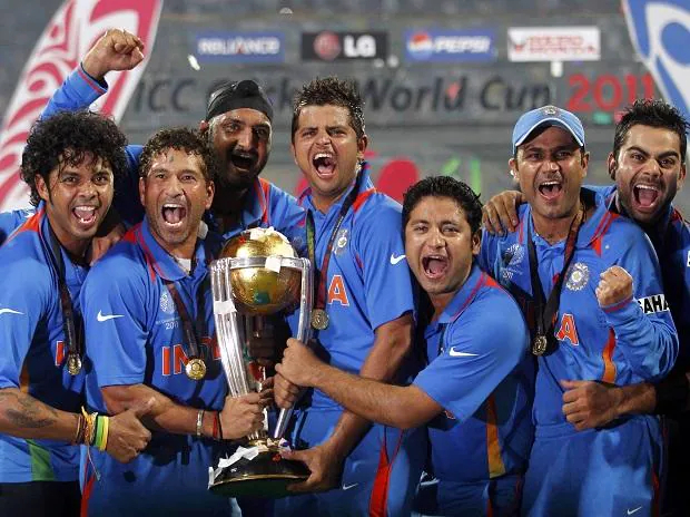 Suresh Raina with Indian team celebrating the 2011 World Cup win | Getty