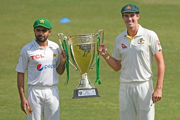 Pat Cummins and Babar Azam | Getty Images