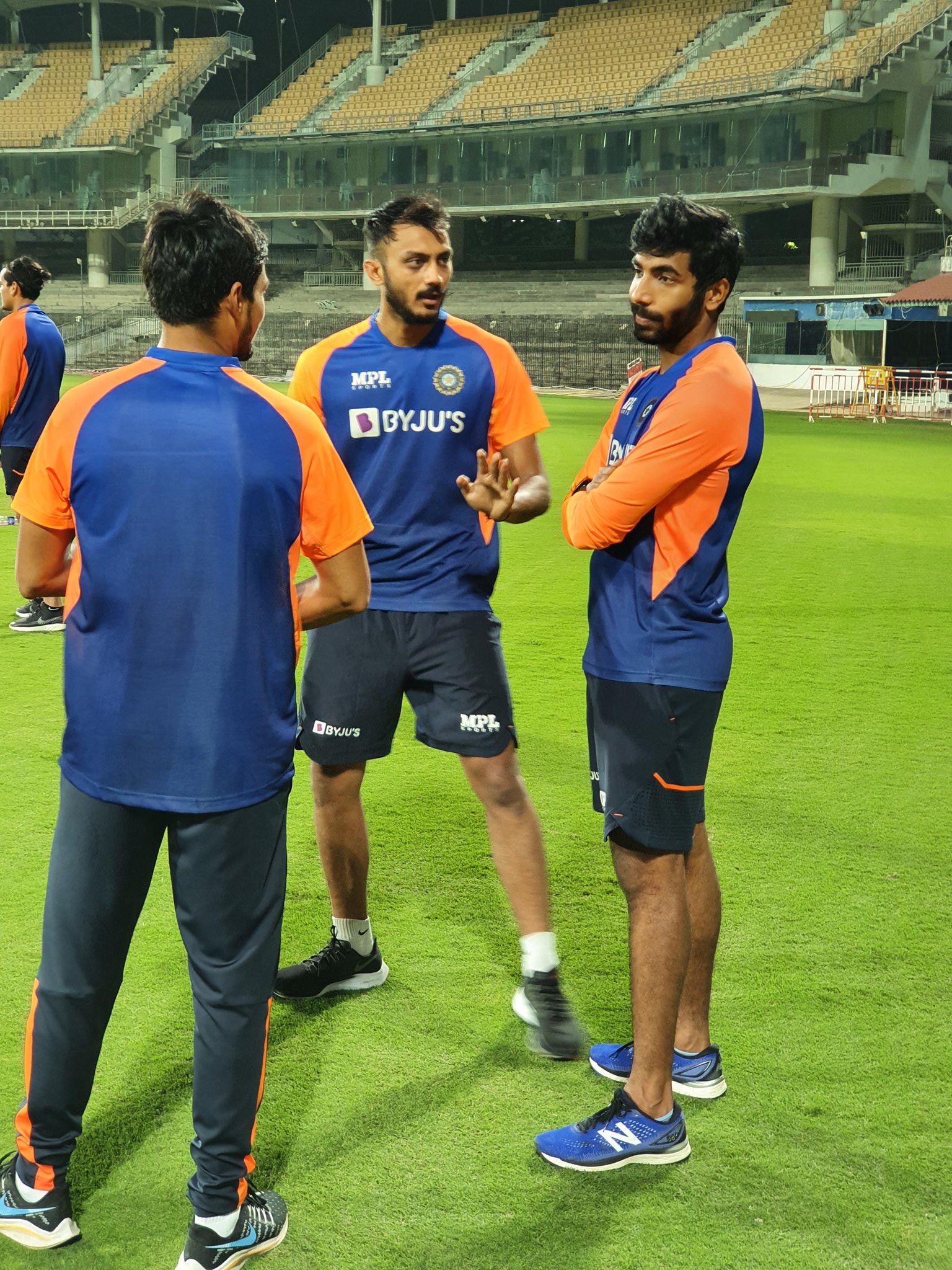 Akshar Patel (C) with Jasprit Bumrah (R) and Shahbaz Nadeem (L) | BCCI