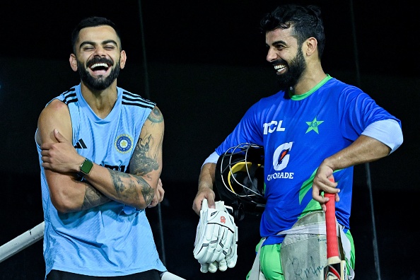 Shadab Khan with Virat Kohli | Getty