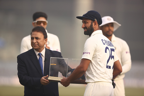 Pujara getting his 100th Test cap from Sunil Gavaskar | Getty