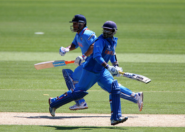MS Dhoni and Dinesh Karthik | Getty