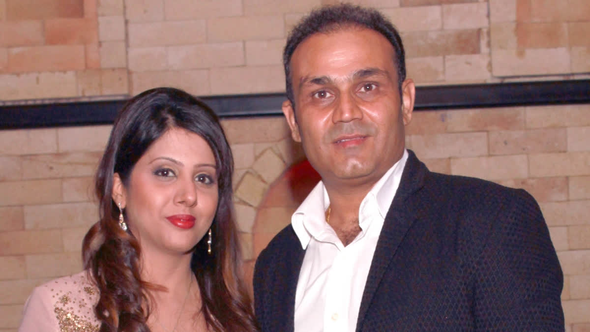 Virender Sehwag with wife Aarti | X