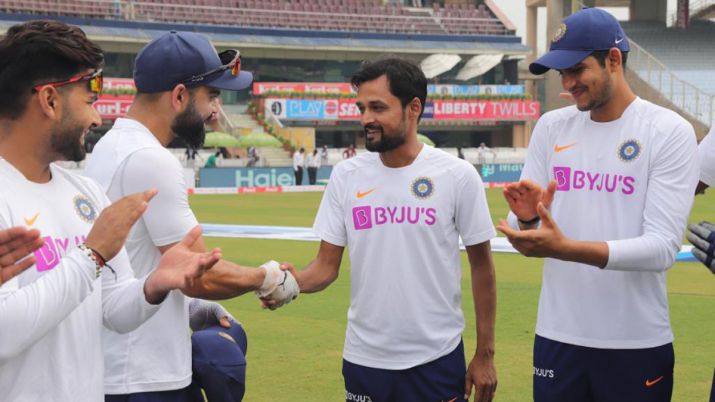 Shahbaz Nadeem being given his Test cap before the Ranchi Test | AFP