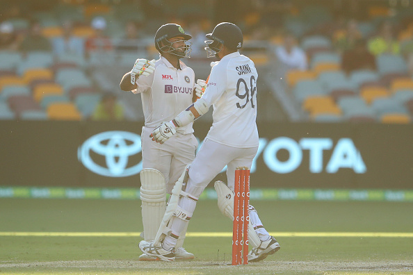 Pant and Saini celebrate after winning the Brisbane Test | Getty