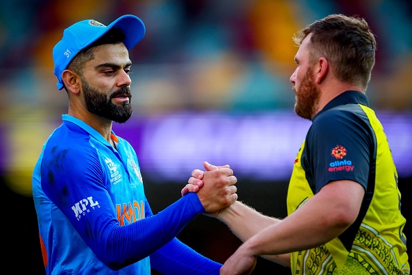 Aaron Finch and Virat Kohli | Getty Images