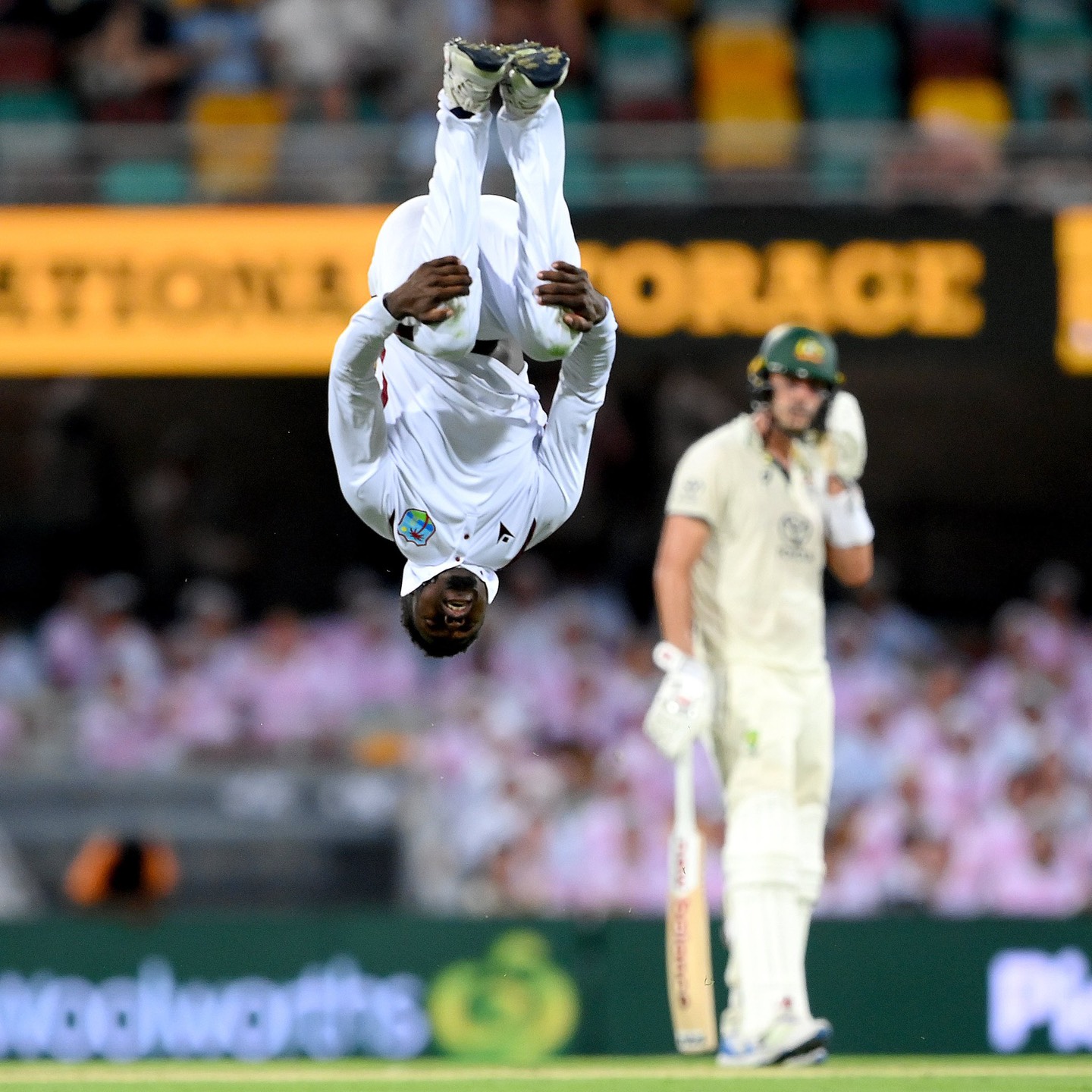 Kevin Sinclair's trademark cartwheel celebration after 1st Test wicket | Getty