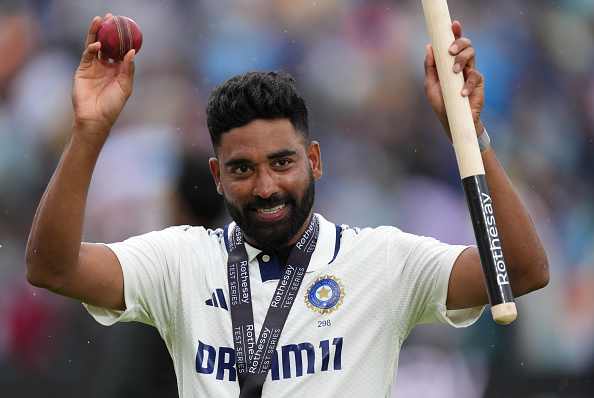 Mohammed Siraj with the Player of the Match medal |Getty