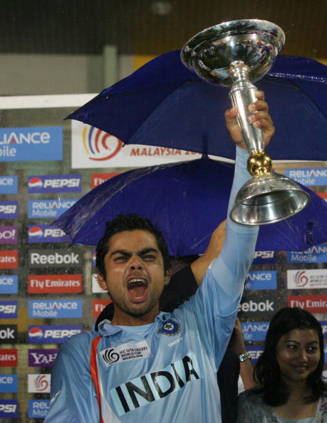 Virat Kohli lifts aloft the U-19 World Cup after defeating South Africa in the final | Getty