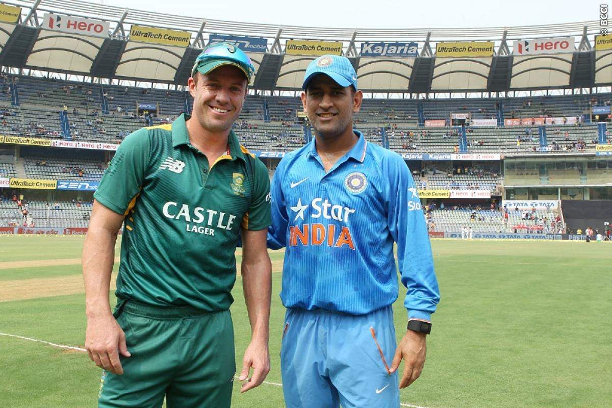 AB de Villiers and MS Dhoni | AFP