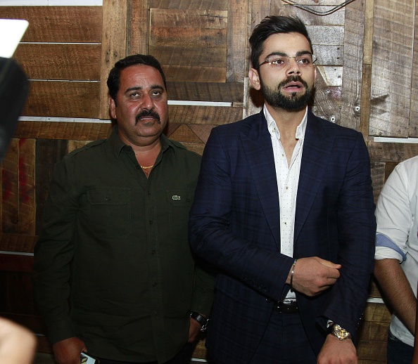 Virat Kohli and Rajkumar Sharma | GETTY