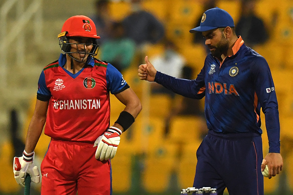 Rahmanullah Gurbaz with Virat Kohli during T20 WC 2021 | Getty