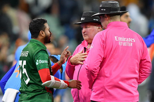 Shakib Al Hasan in conversation with umpires after rain stopped | Getty